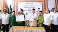 Menteri Nusron Dan Ketua DPP PUI Teken MoU